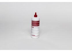 weiße Flasche des NORIT-Klebstoffes mit rotem Etikett und rotem Verschluss.