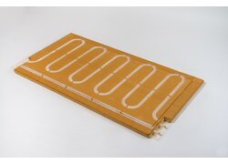 Lehm-Klimaplatte mit integrierter Heizschlange.